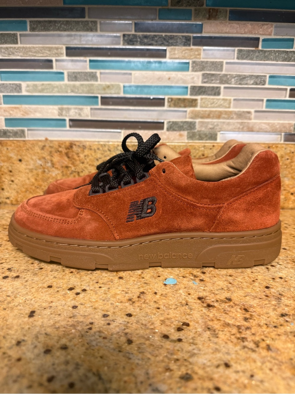 New Balance unisex Suede Sneaker in Rust Orange with Gum Sole